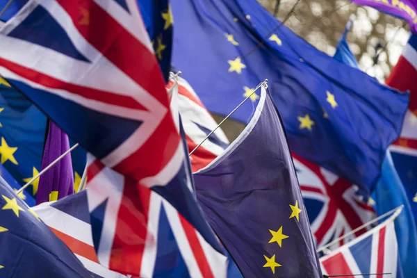European Union and British Union Jack flag flying together. A symbol of the Brexit EU referendum