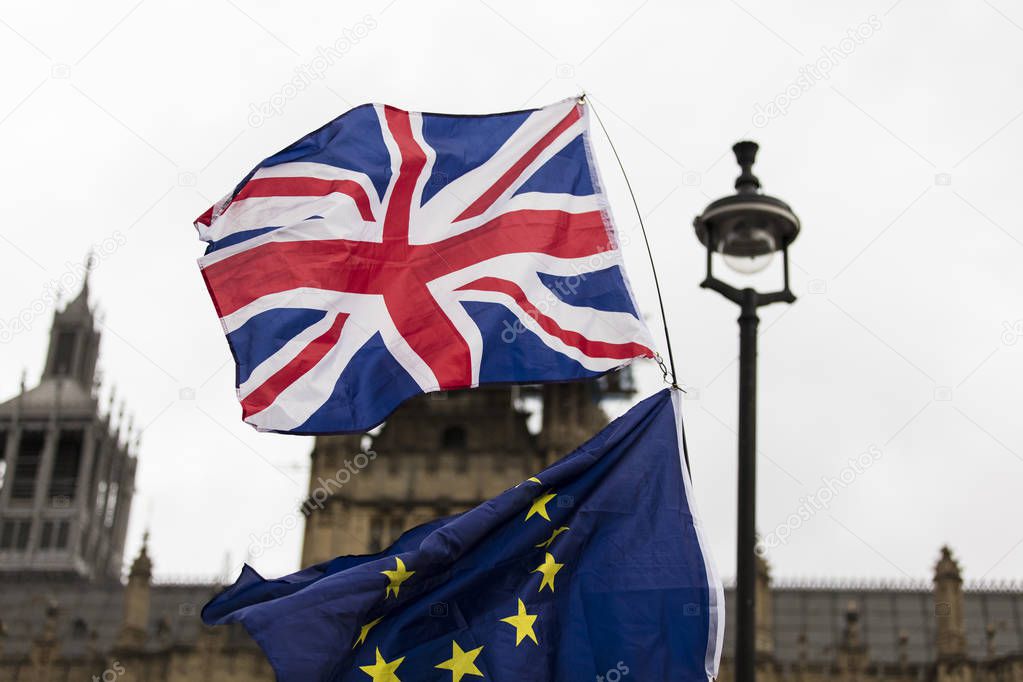 European Union and British Union Jack flag flying together. A symbol of the Brexit EU referendum