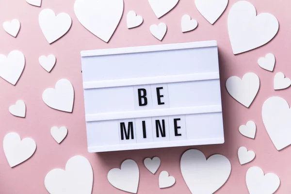 Be mine lightbox message with white hearts on a pink background — Stock Photo, Image