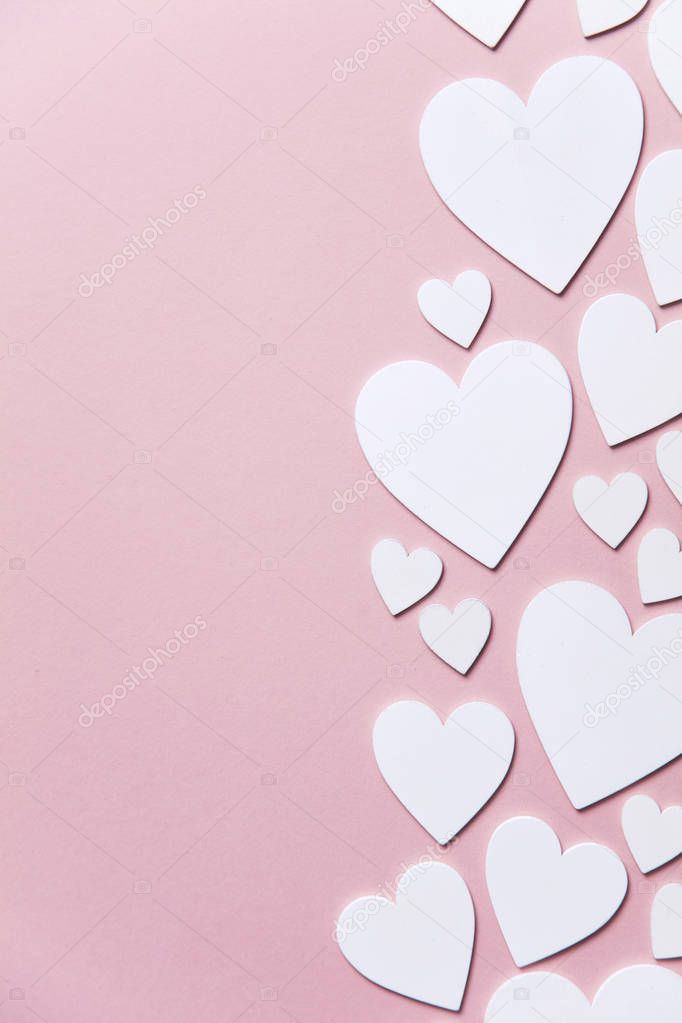 White hearts on a pastel pink background. Valentine's day, Mother's day background