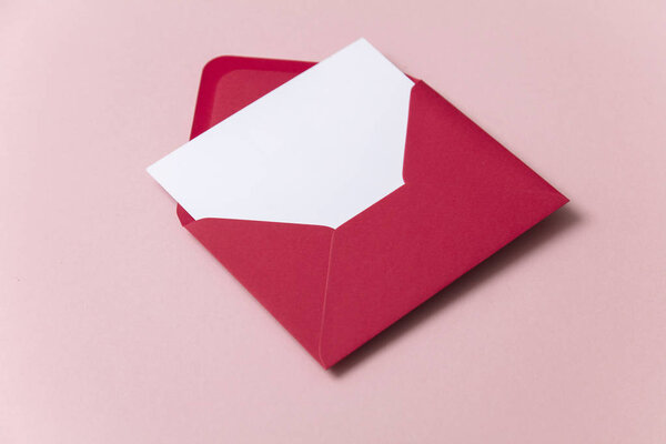 Blank white card with red paper envelope template mock up