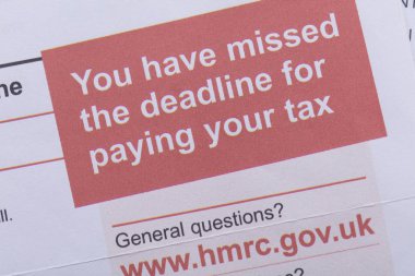 LONDON, UK - January 24th 2019: HMRC, Her Majesty's Revenue and Customs tax return paperwork. clipart