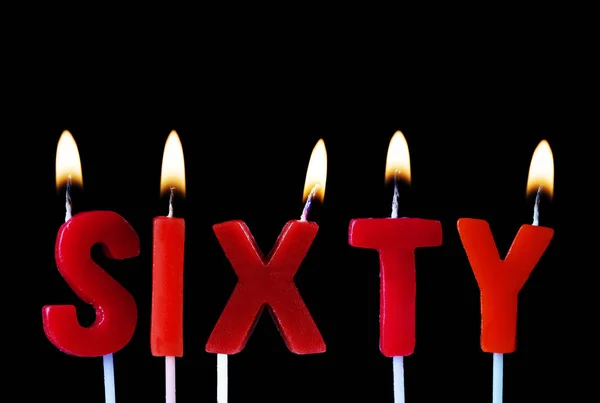 Sixty Spellt Out Red Birthday Candles Black Background — Stock Photo, Image