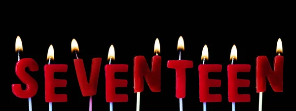 Seventeen Spellt Out Red Birthday Candles Black Background — Stock Photo, Image