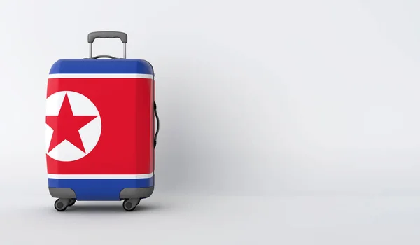 Utazás Észak-Korea zászlaja bőröndöt. Nyaralóhely. 3D render — Stock Fotó
