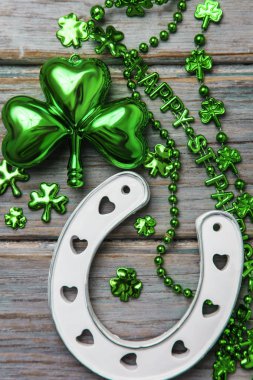 St Patricks Day lucky horse shoe and green shamrock clipart