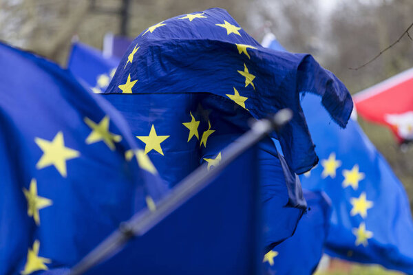Flags of the European Union flying at a brexit march in London
