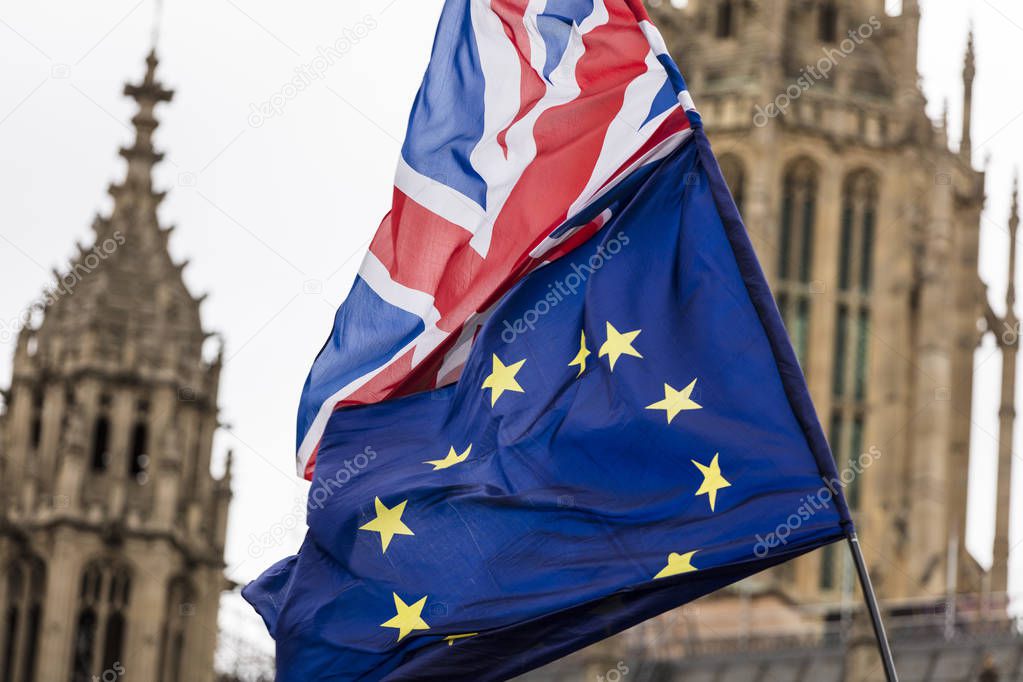 European Union and British Union Jack flag flying together. 