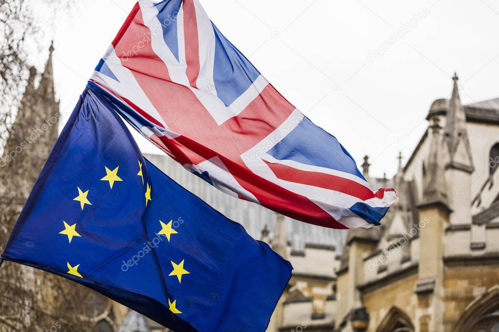 European Union and British Union Jack flag flying together. 