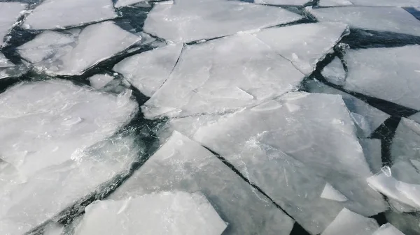 Superficie congelada del océano agrietada. clima extremo —  Fotos de Stock