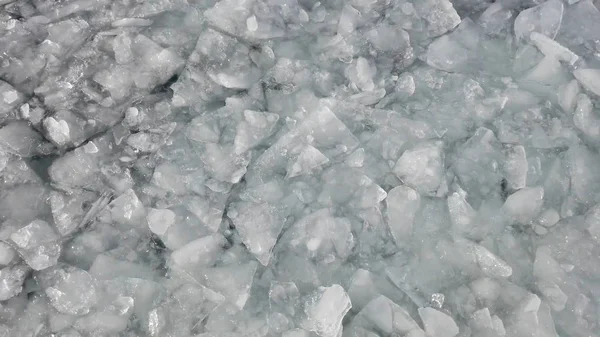Close up of the ocean frozen over. melting and cracking. Climate change