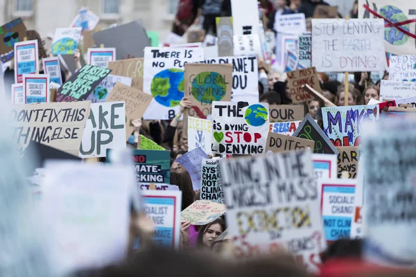 Thousands of students and young people protest in London as part of the youth strike for climate marches Royalty Free Stock Photos