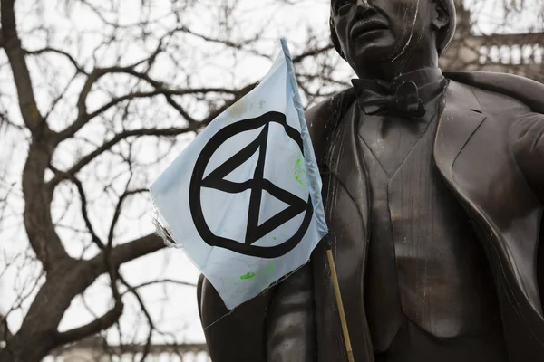 LONDON, UK - April 23, 2019: Members of the Extinction Rebellion protest in parliment square, London — Stock Photo, Image