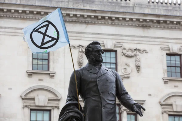 LONDON, UK - April 23, 2019: Members of the Extinction Rebellion protest in parliment square, London — Stock Photo, Image