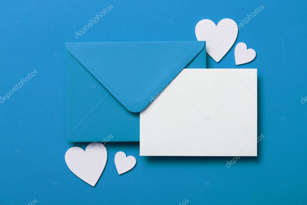 Fathers Day card mockup. Blue envelope blank white card and hearts