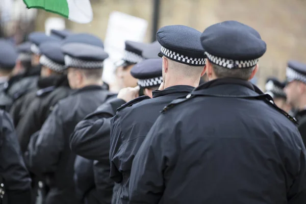 LONDON, UK - June 4th 2019: Police officers from the Metropolitan police force line up during a political protest event in London — Stock Photo, Image