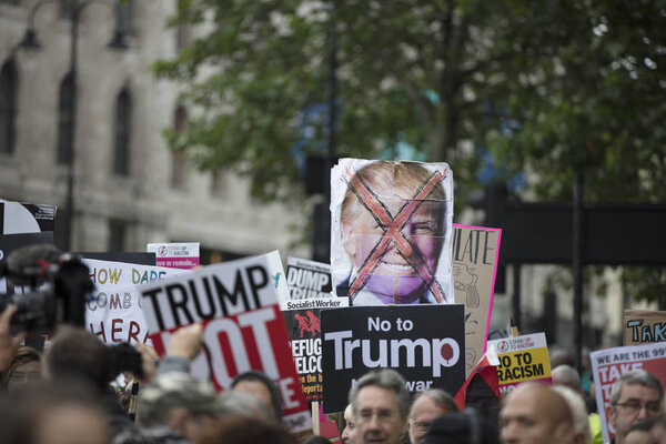 LONDON, UK - June 4th 2019: Large crowds of protesters gather in central London to demonstrate against President Trumps state visit to the UK