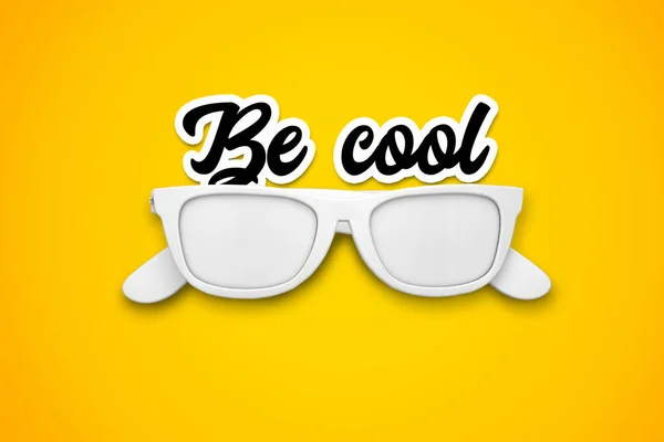 Be Cool message with white sunglasses on a bright yellow backgro — Stock Photo, Image