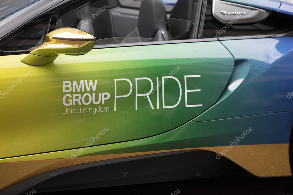 LONDON, UK - July 6th 2019: A BMW car with a pride label and rainbow paint finish at the annual pride event in London
