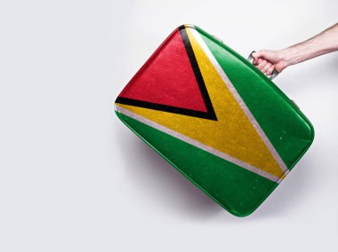 Eski bir deri bavul Guyana bayrağı.