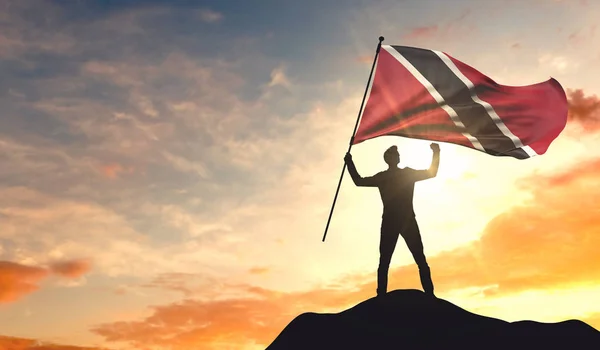 Trinidad e tobago bandeira sendo acenada por um homem comemorando sucessos — Fotografia de Stock