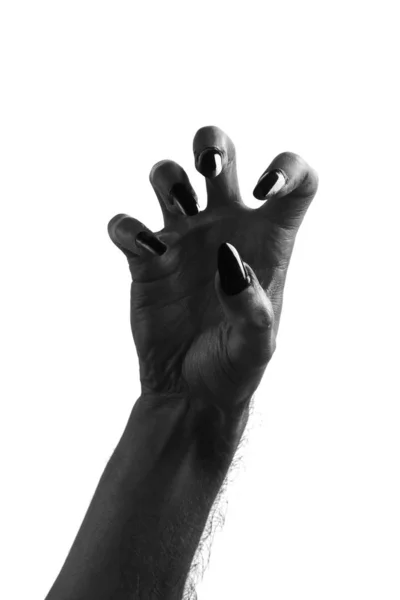 Schwarze gruselige Halloween-Monster-Hand mit langen Nägeln — Stockfoto