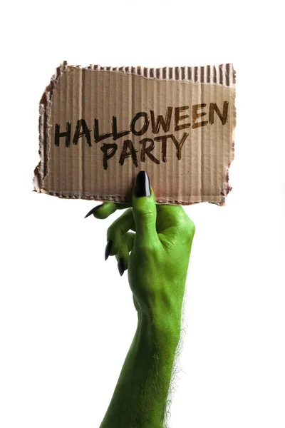 Buona festa. streghe verdi o zombie mano mostro in possesso di una carta — Foto Stock