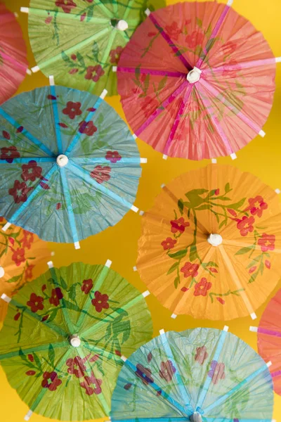 Cocktail umbrella summertime background