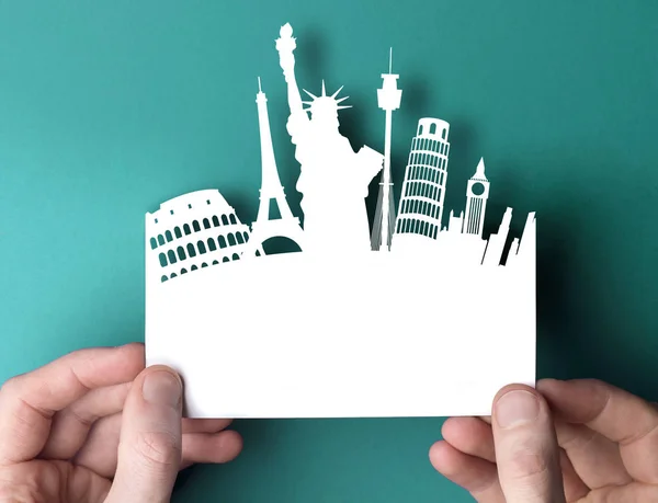 Travel paper cut out shape with famous city travel destination l