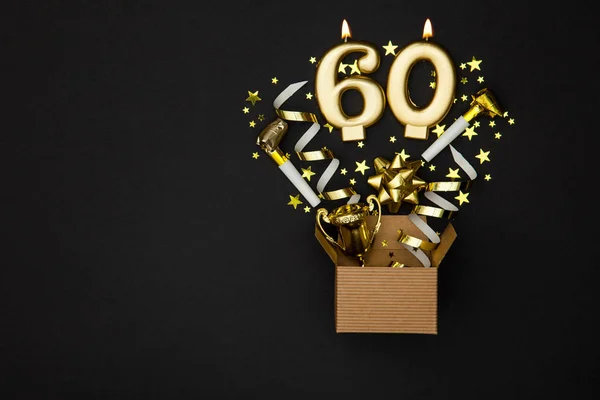 Numero 60 candela celebrazione d'oro e scatola regalo sfondo — Foto Stock