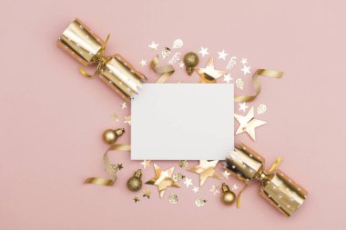 Gold Christmas cracker with a blank white label. luxury gold fes clipart