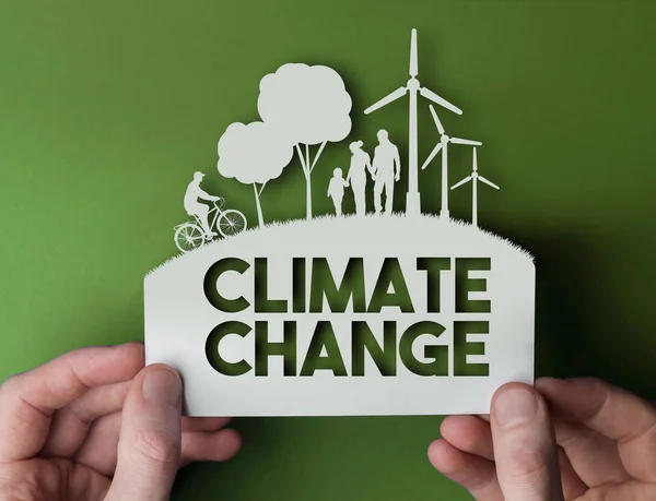 Klimawandel - Hintergrund des grünen Umweltpapiers mit Wind — Stockfoto