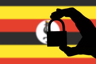 Uganda güvenliği. Natio üzerinde bir asma kilit tutan el silueti