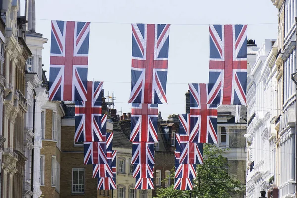 Union Jack flags hang in Central London in preperation for the r