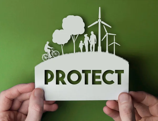 Protect - green environmental paper background with wind turbine — Stock Photo, Image