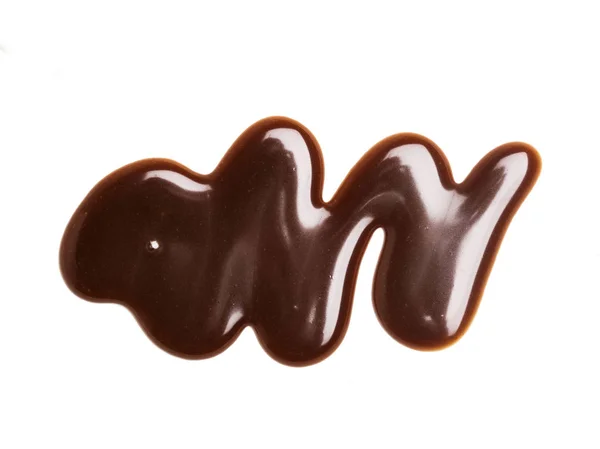 Schokoladen-Karamell-Sauce auf schlichtem weißem Hintergrund — Stockfoto