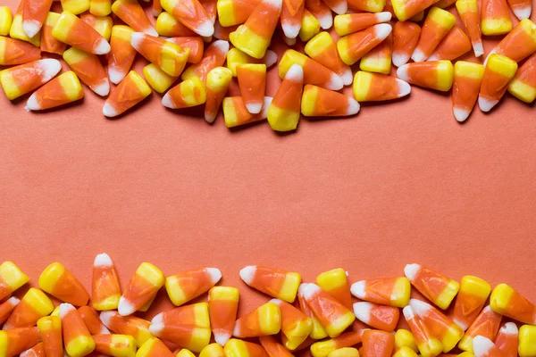 Halloween candy corn sweet background with copy space