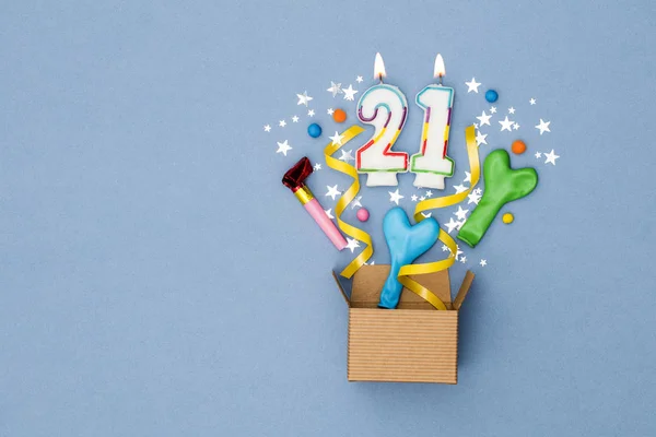Number 21 celebration present background. Gift box exploding wit — Stock Photo, Image