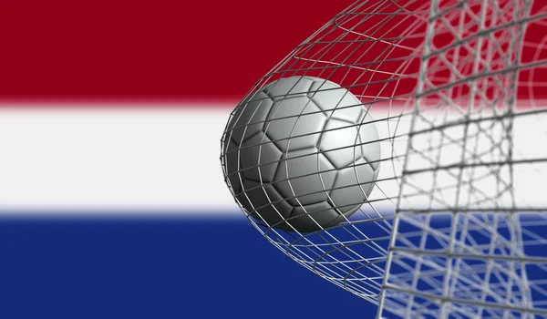 Fußball erzielt ein Tor in einem Netz gegen die Flagge der Niederlande. 3d — Stockfoto