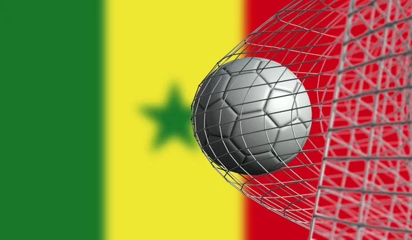 Le ballon de football marque un but dans un filet contre le drapeau du Sénégal. Rend 3D — Photo