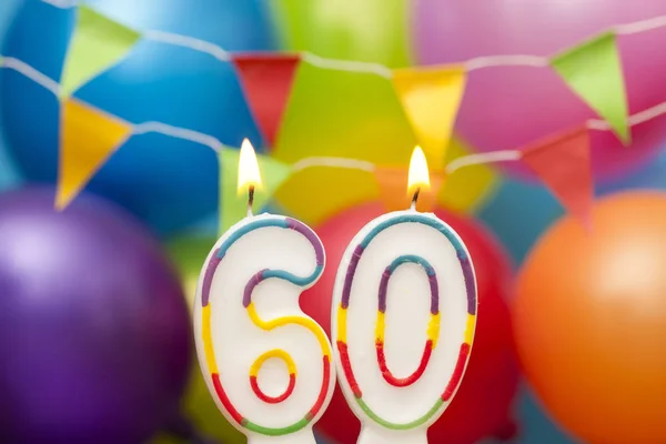 Szczęśliwy numer urodziny 60 uroczystość świeca z kolorowych Balloo — Zdjęcie stockowe