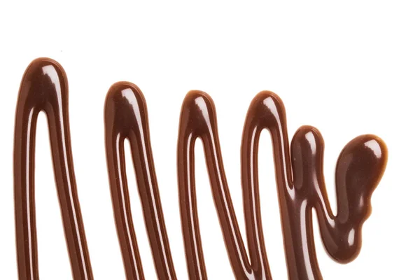 Chocolate caramel sauce ripple on a plain white backround — Stock Photo, Image