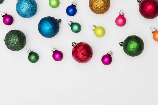 Festive Christmas baubles on a plain white background — Stock Photo, Image