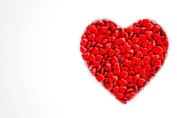Коллекция красных сердец любви, образующих фон в форме сердца — стоковое фото