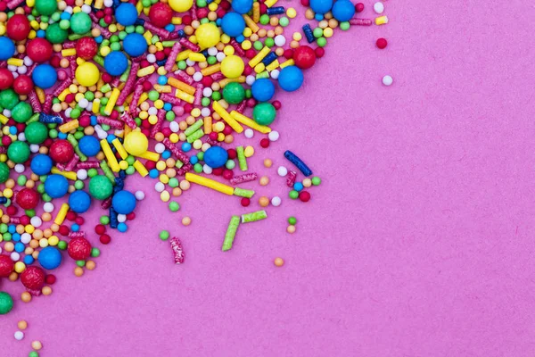 Colourful candy cake decorative sprinkles background — Stock Photo, Image