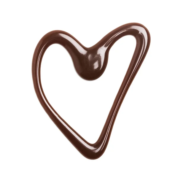 Schokolade-Karamell-Sauce Herzform auf einem schlichten weißen Hintergrund — Stockfoto