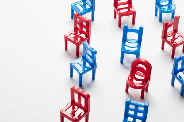 Collection of blue and red chairs — Stock Photo, Image