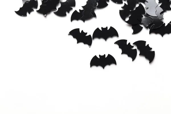 Black bat shapes on a white background. Halloween background — Stock Photo, Image