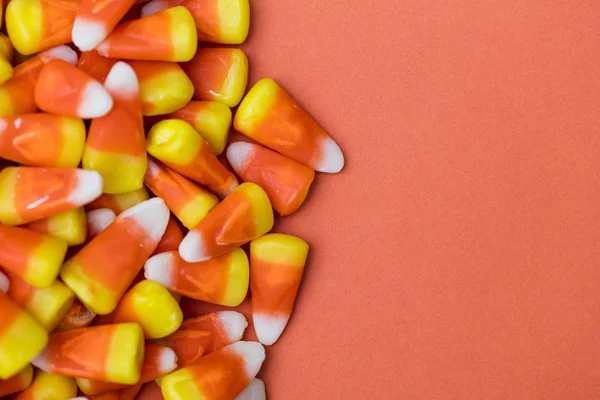 Halloween candy corn sweet background with copy space