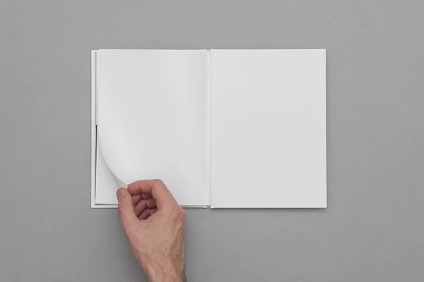 Book mockup. Male hand holding blank book. — Stock Photo, Image